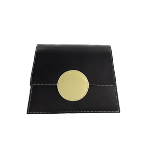 Moonlight black recycled leather shoulder bag by ISLI Studio with a radiant yellow accent, front view