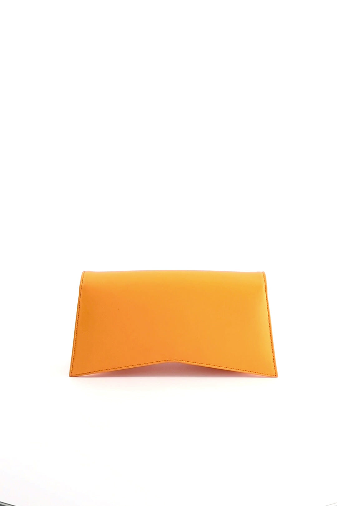 Jelija Bag in Golden Orange, glossy recycled leather clutch with angular flap, ISLI Studio