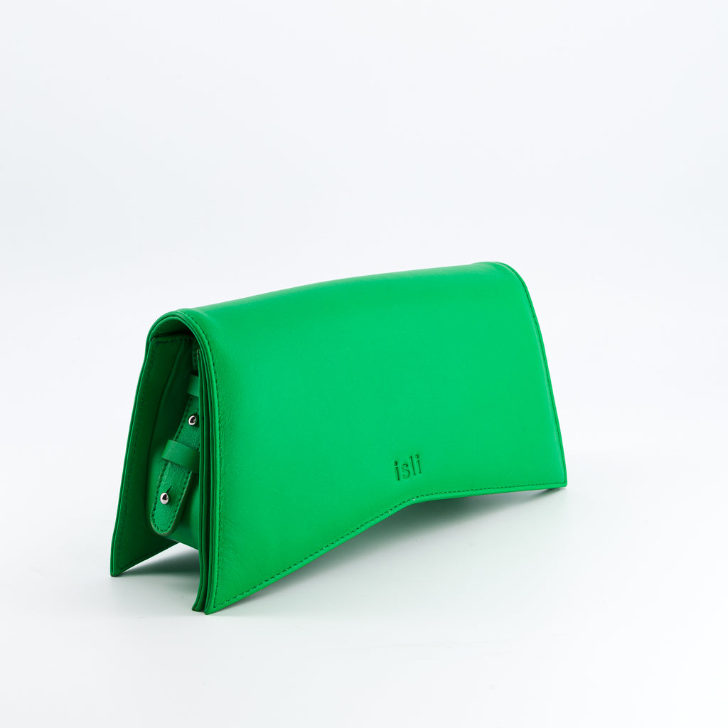 Jelija Bag in Green, angled view showing the adjustable strap and metal clasp, ISLI Studio