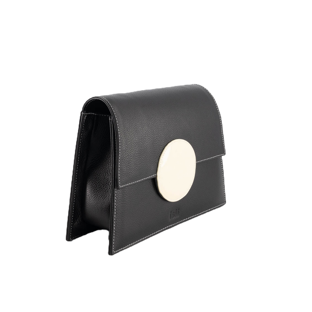 Sunset Shadow compact leather bag in deep black with soft beige panel, ISLI Studio