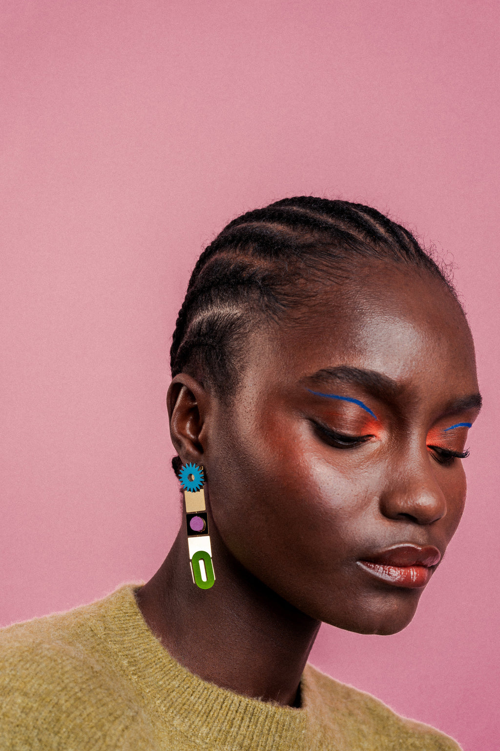 Awrir Soleil colorful statement earrings by ISLI Studio, side view of green, lilac and blue shapes