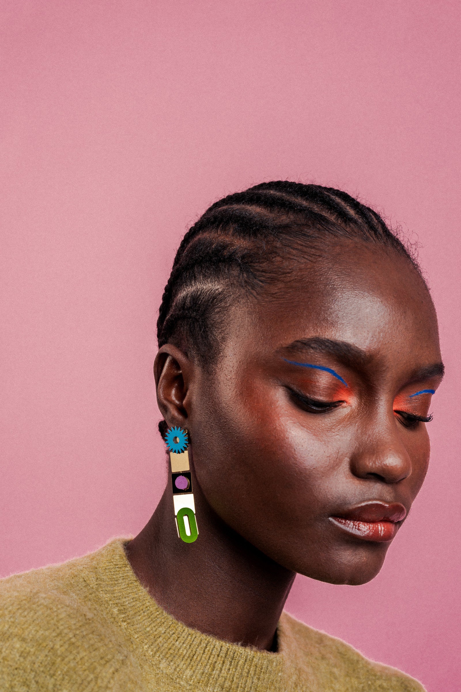 Awrir Soleil colorful statement earrings by ISLI Studio, side view of green, lilac and blue shapes